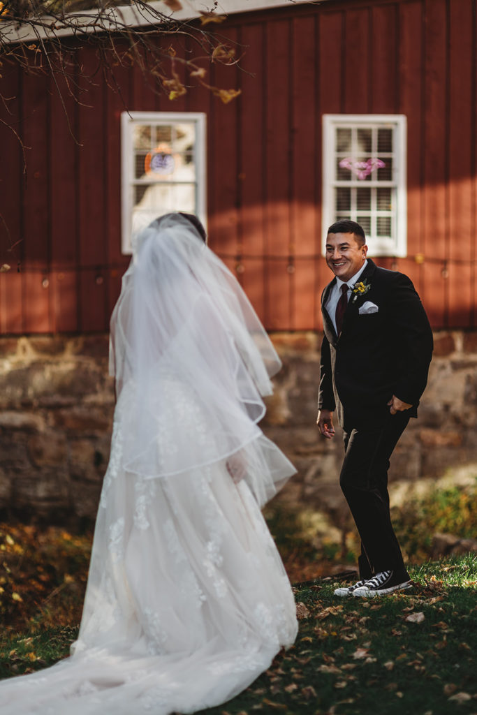 Maryland wedding photographer captures grooms reaction to seeing his bride for the first time on their wedding day