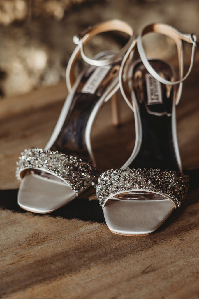 brides silver wedding shoes with crystals on the strap captured by Baltimore wedding photographers