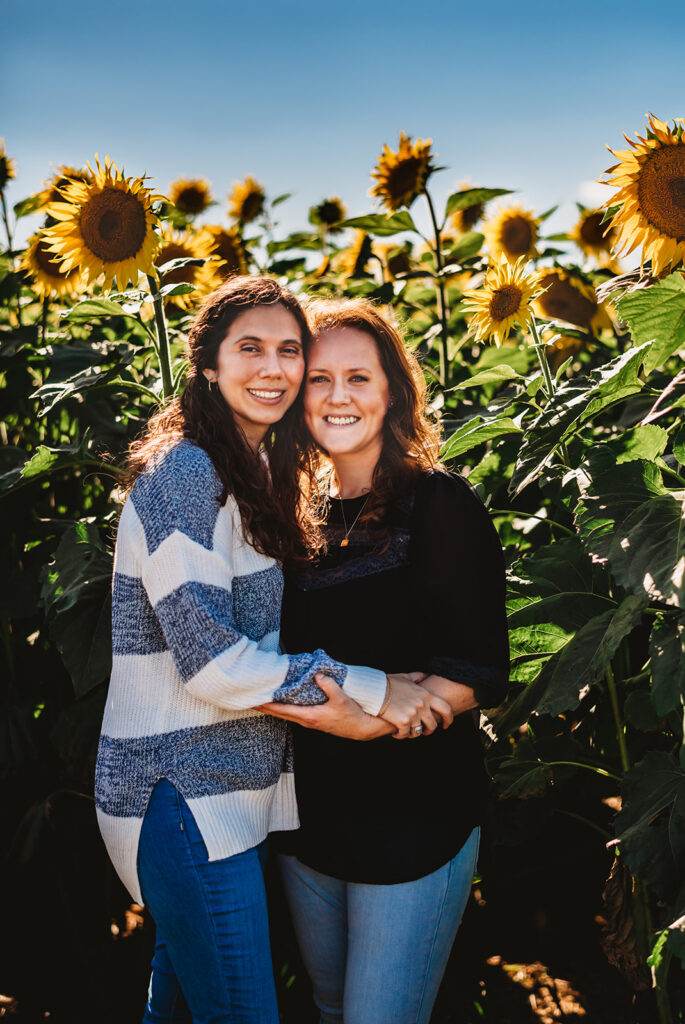 Baltimore photographers capture women hugging in sunflower field