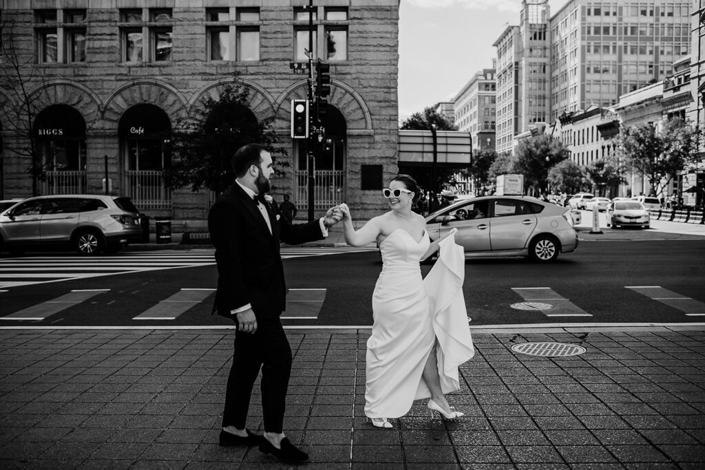 Baltimore wedding photographer captures bride and groom in black and white portrait downtown