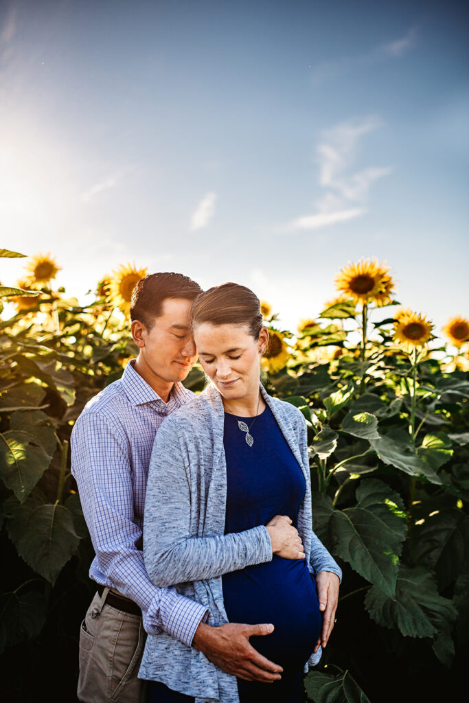 Baltimore photographers capture mother and father during sunflower session