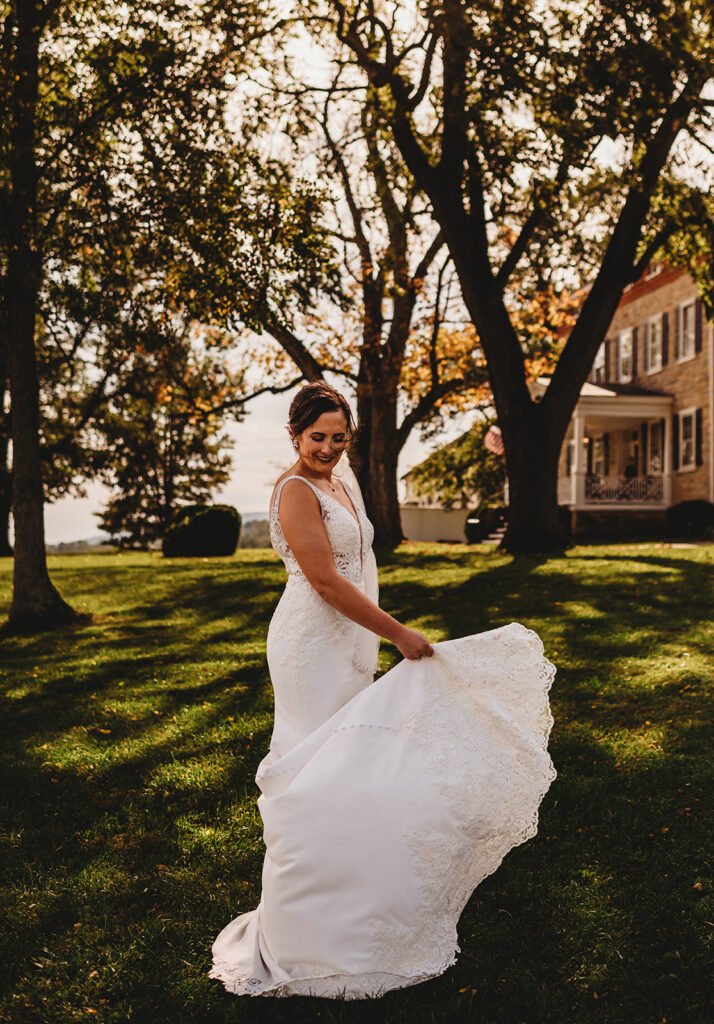 Baltimore wedding photographers capture bride swinging dress 