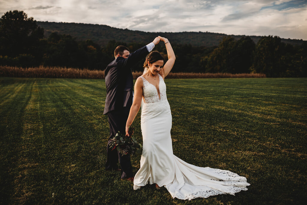 Baltimore wedding photographers capture groom spinning bride 