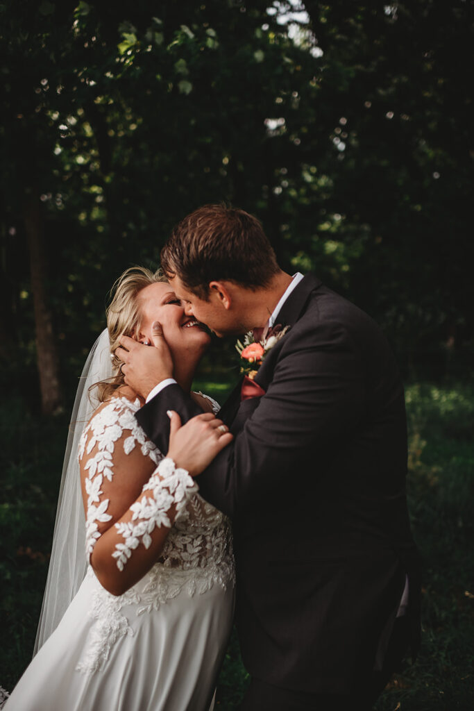 Maryland wedding photographer captures groom kissing bride