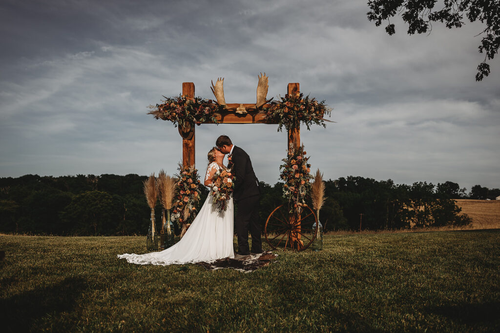Baltimore wedding photographers capture bride and groom kissing