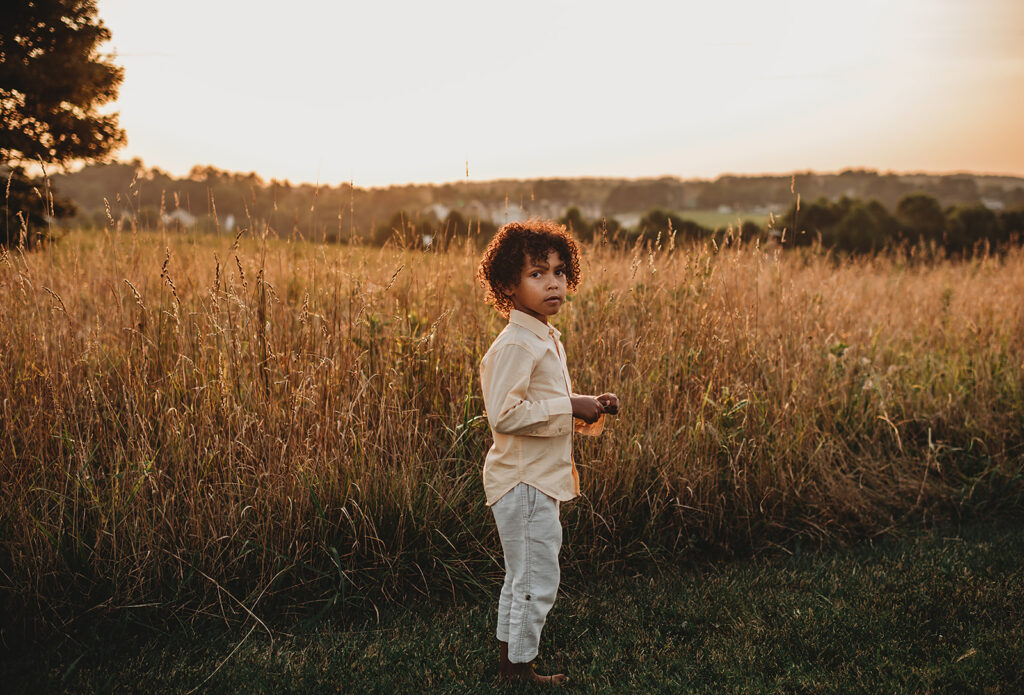 Baltimore photographer captures child standing in field