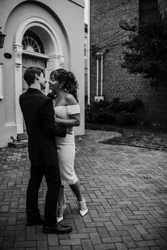 Maryland engagement photographers capture man and woman hugging during editorial photoshoot