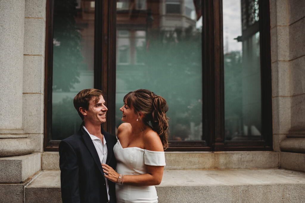 Maryland engagement photographers capture man and woman laughing  together 