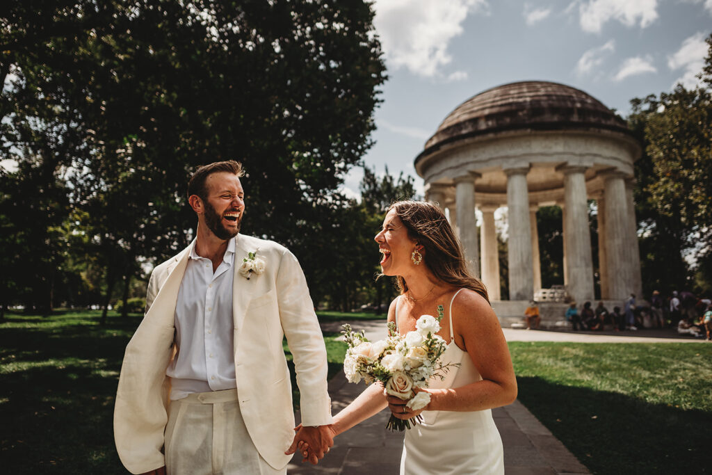 Baltimore wedding photographer captures man and woman celebrating recent wedding at War Memorial