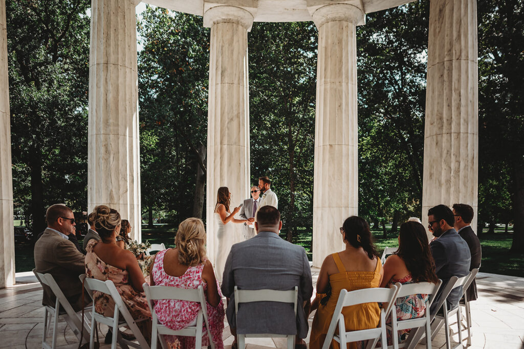 Baltimore wedding photographer captures guests watching wedding ceremony