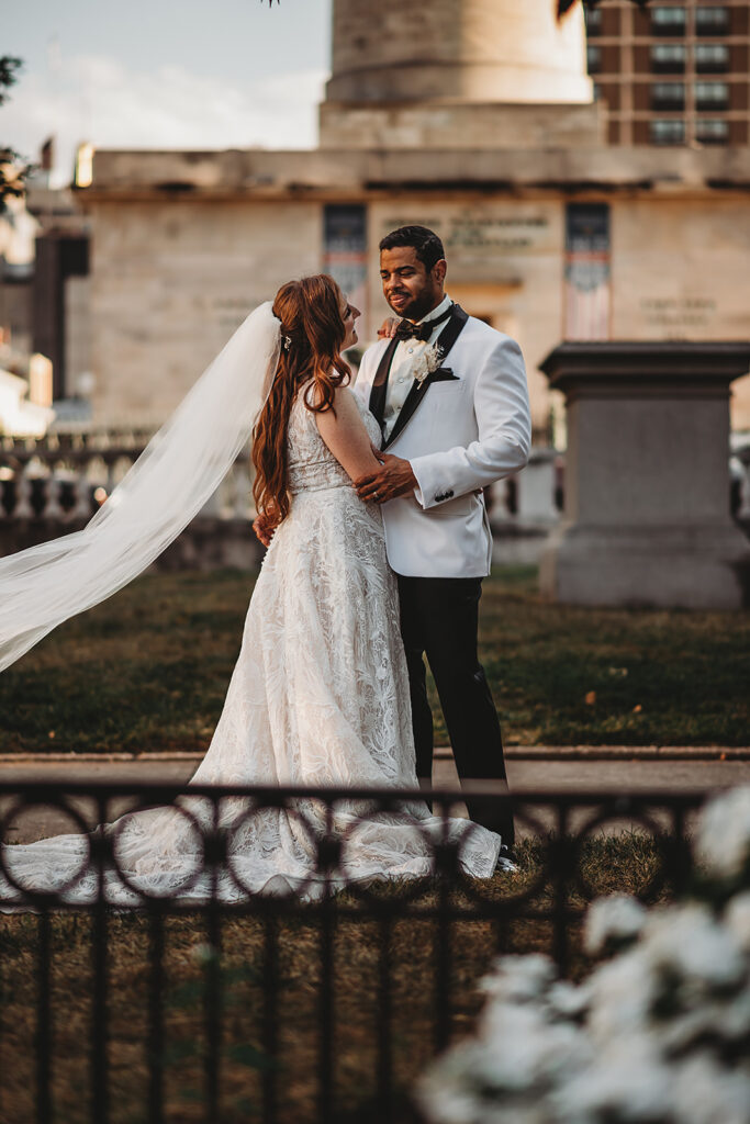Baltimore wedding photographers capture bride and groom embracing