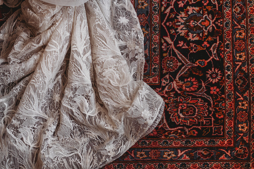 Baltimore wedding photographer captures wedding dress on rug