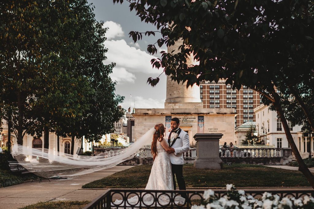 Baltimore wedding photographer captures bride and groom downtown during portraits
