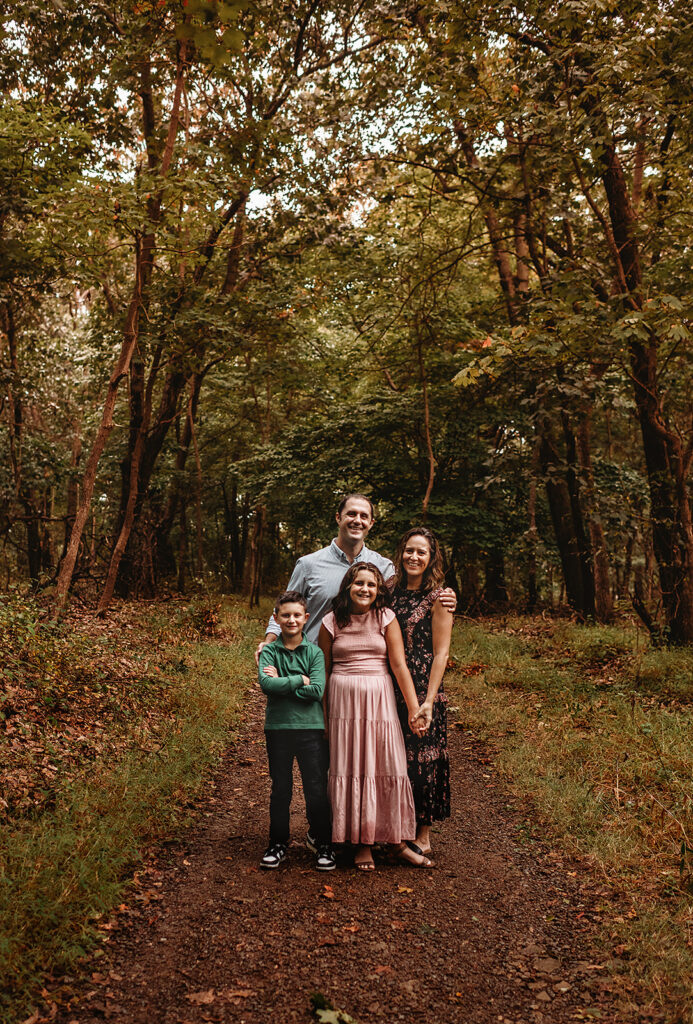 Baltimore photographers capture family standing together during fall family photos