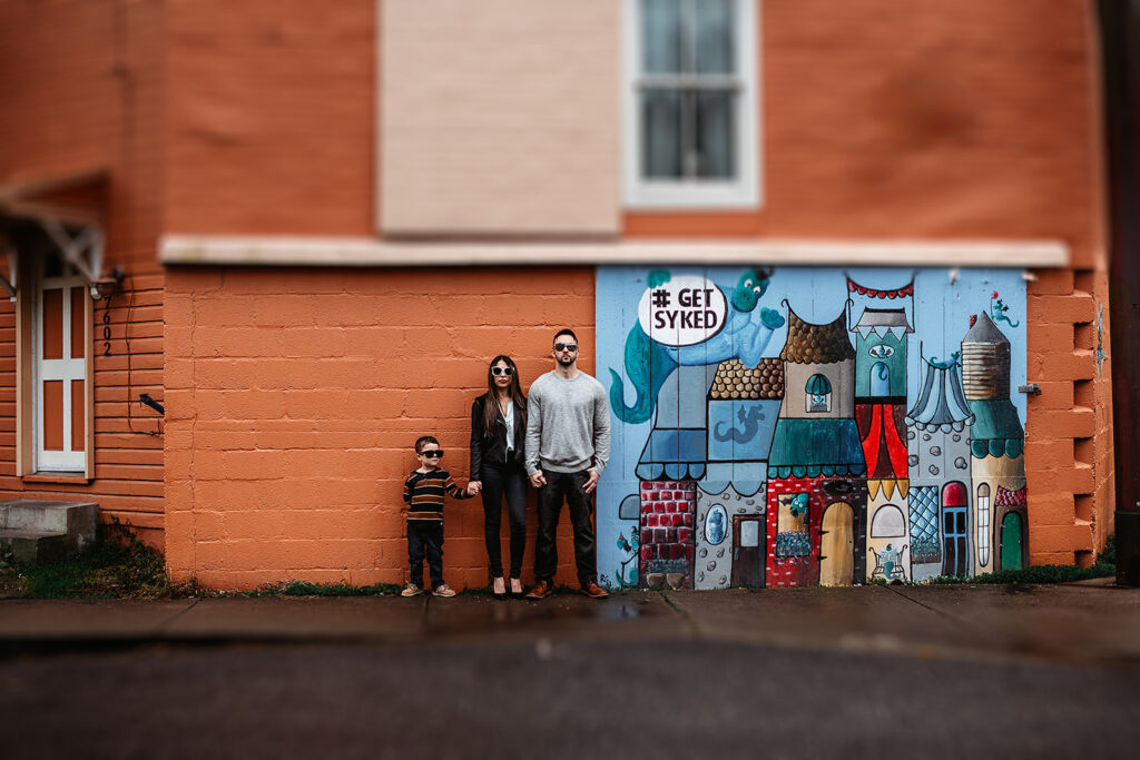 Baltimore photographers capture family standing against mural