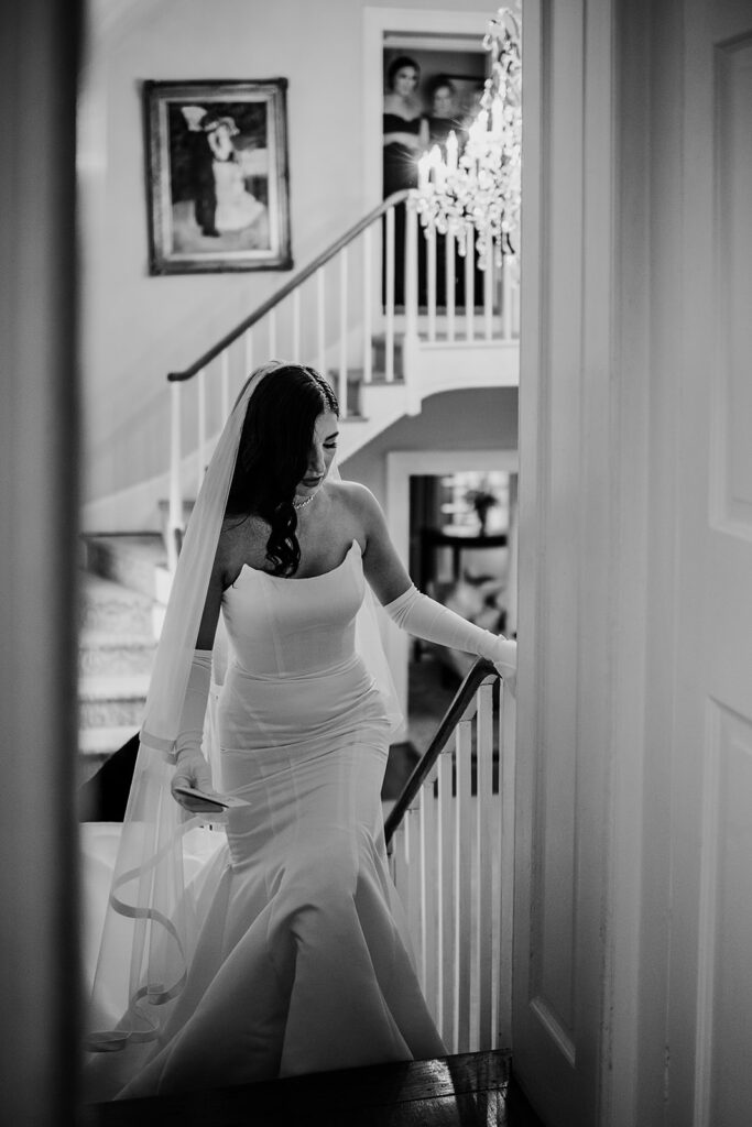 Baltimore wedding photographer captures bride walking in wedding gown 