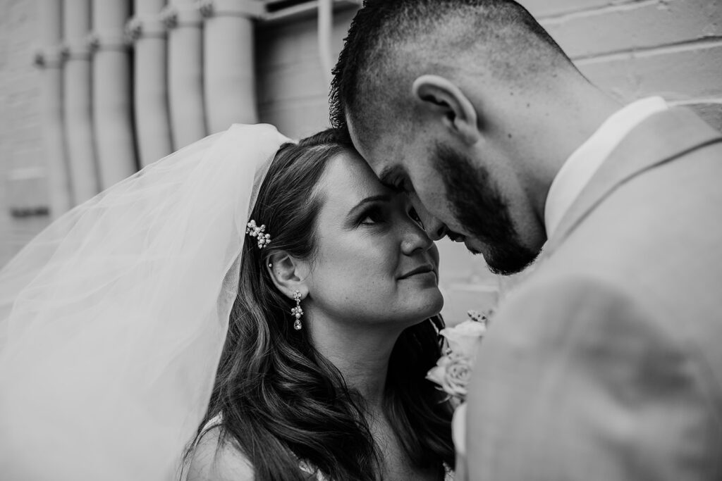 Maryland wedding photographer captures bride and groom touching foreheads
