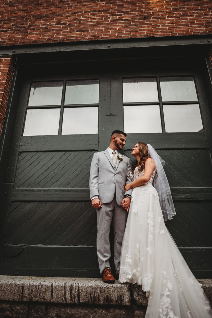 Maryland wedding photographer captures bride and groom embracing during outdoor bridals