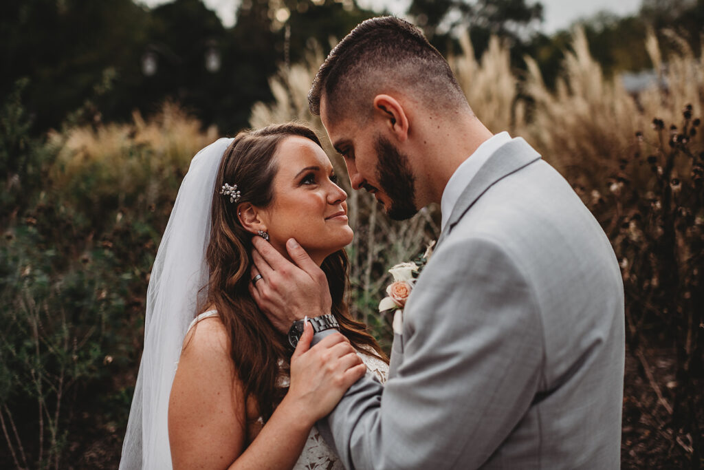 Maryland wedding photographer captures groom holding bride's face 