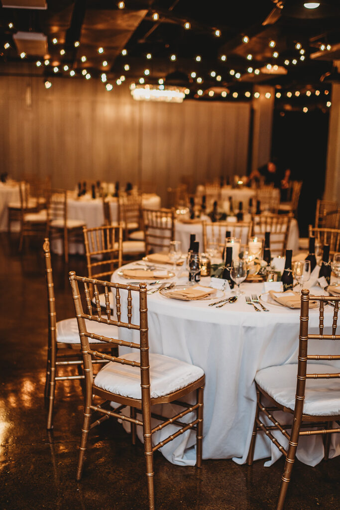 Maryland wedding photographer captures ballroom set up for evening dinner reception at Ellicott City Wedding Venue