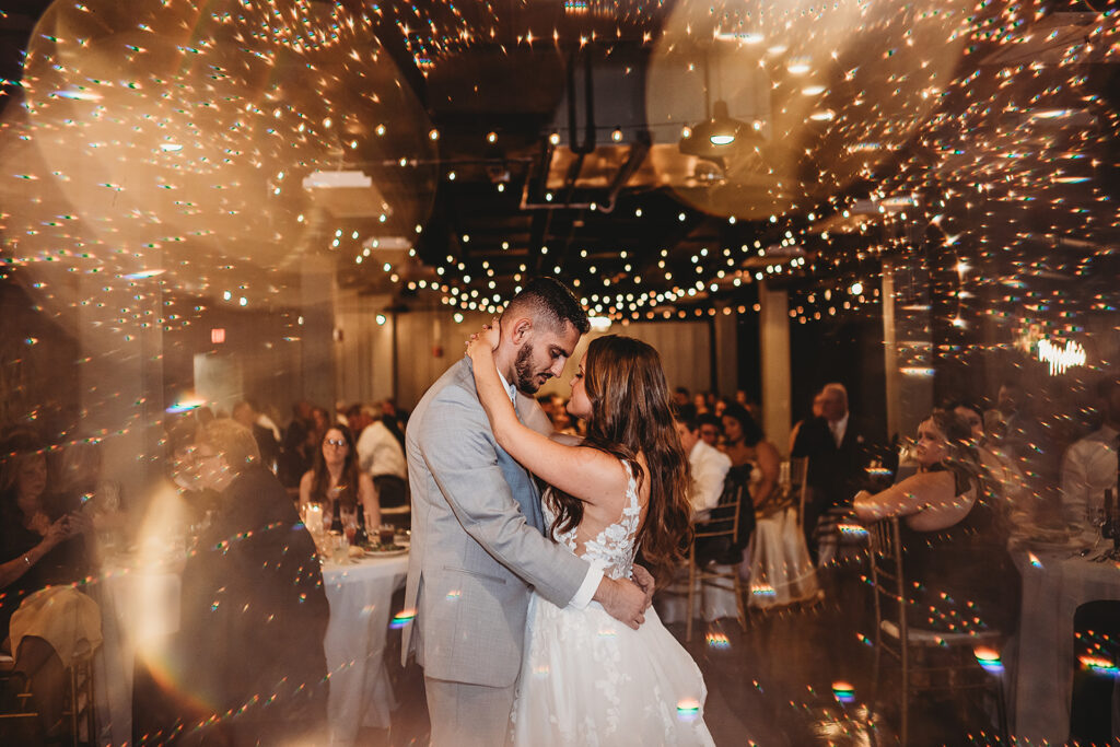Maryland wedding photographer captures bride and groom dancing during first dance after Ellicott City wedding venue ceremony