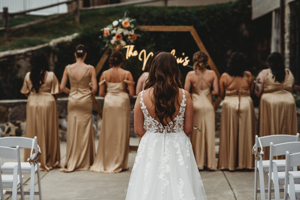 Maryland wedding photographer captures bride waiting for first look with bridesmaids