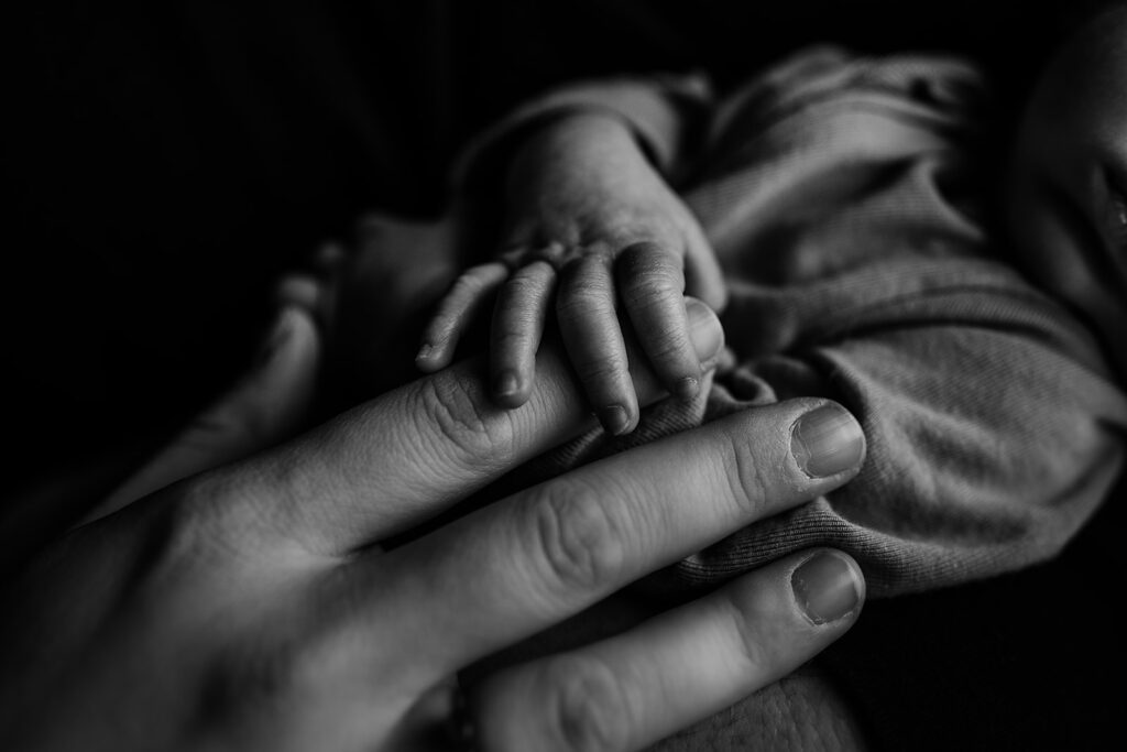 Baltimore photographers capture newborn photos with baby hands