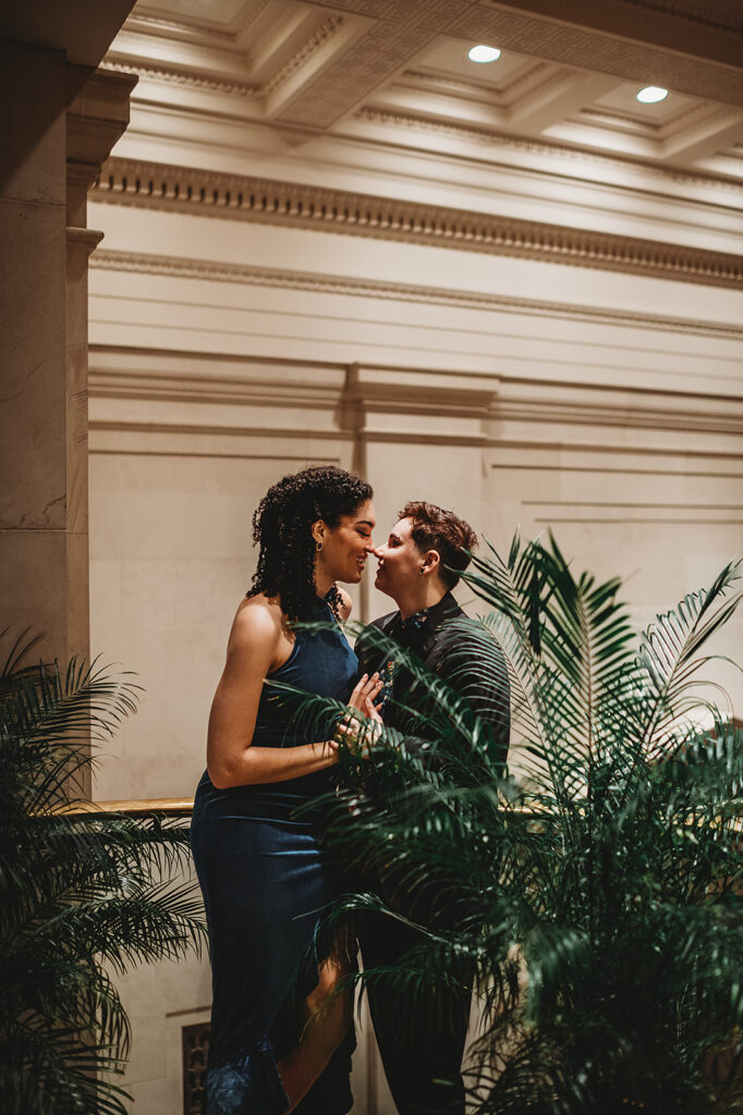 Maryland engagement photographer captures couple holding hands and touching noses