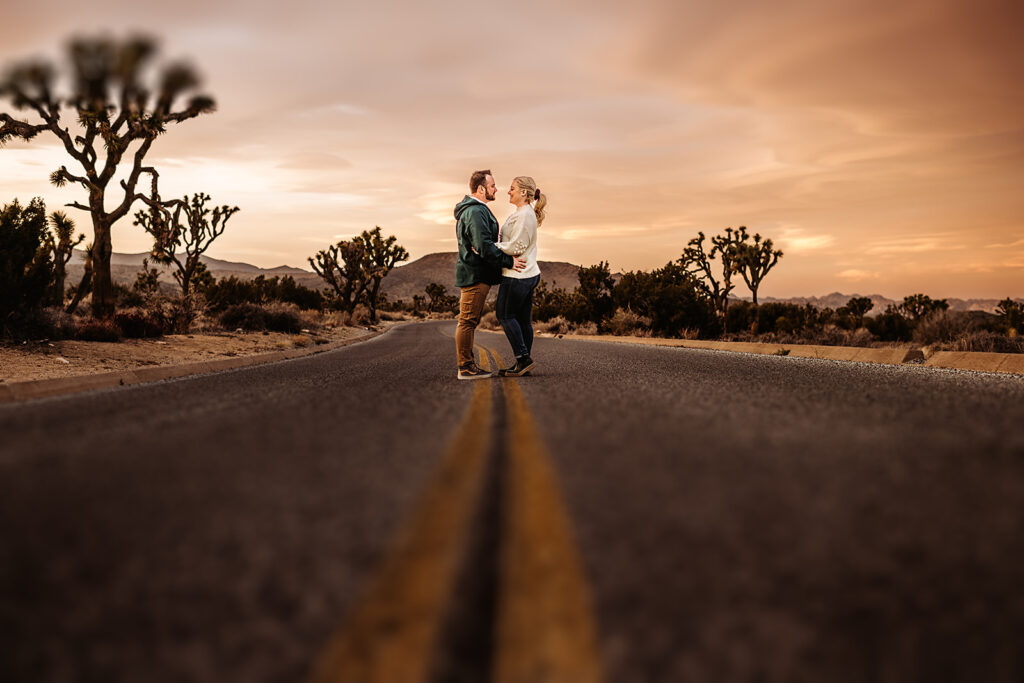 Baltimore photographers capture couple embracing in street during sunset