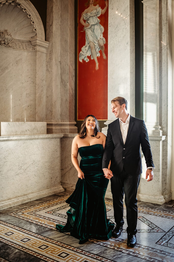Baltimore wedding photographer captures bride and groom walking through Library of Congress