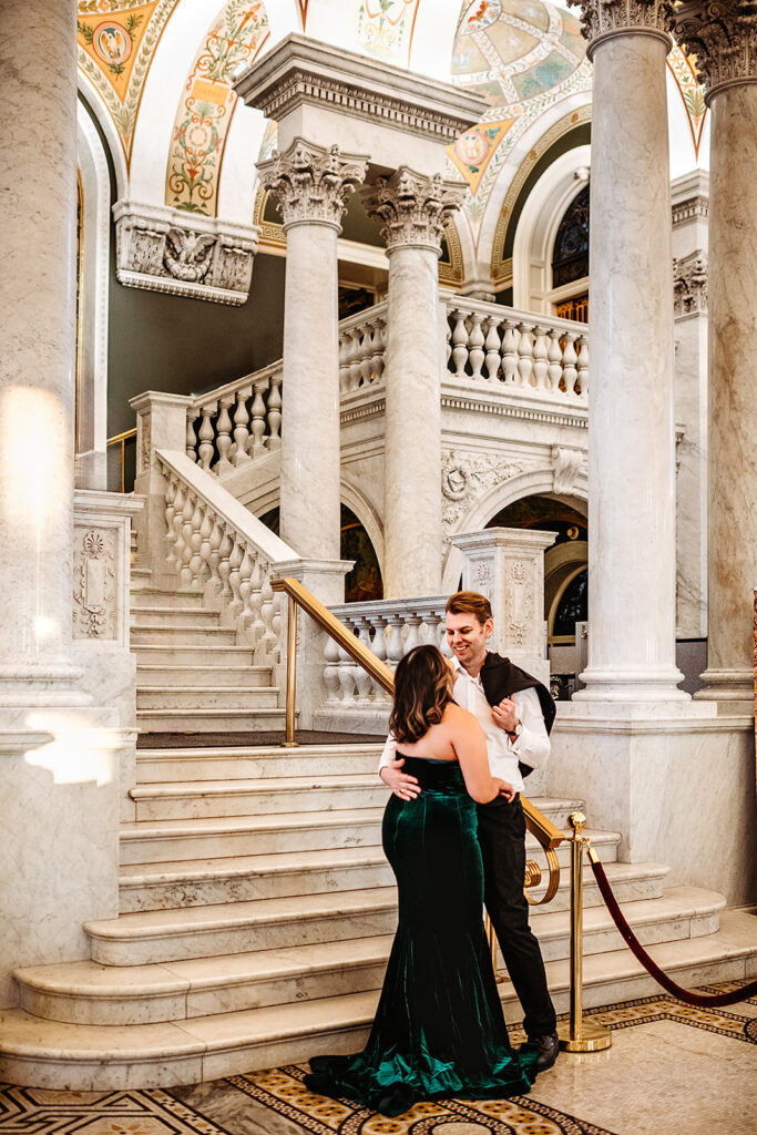 Baltimore wedding photographer captures bride and groom cuddled up in Library of Congress