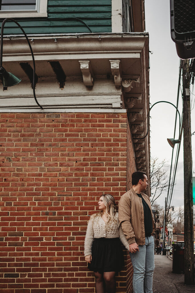 Baltimore photographer captures couple standing together holding hands
