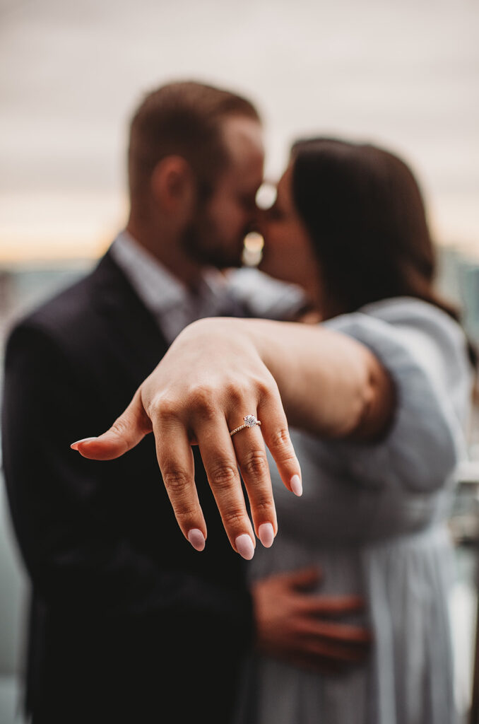 Baltimore Wedding Photographer captures woman holding out hand to show off engagement ring