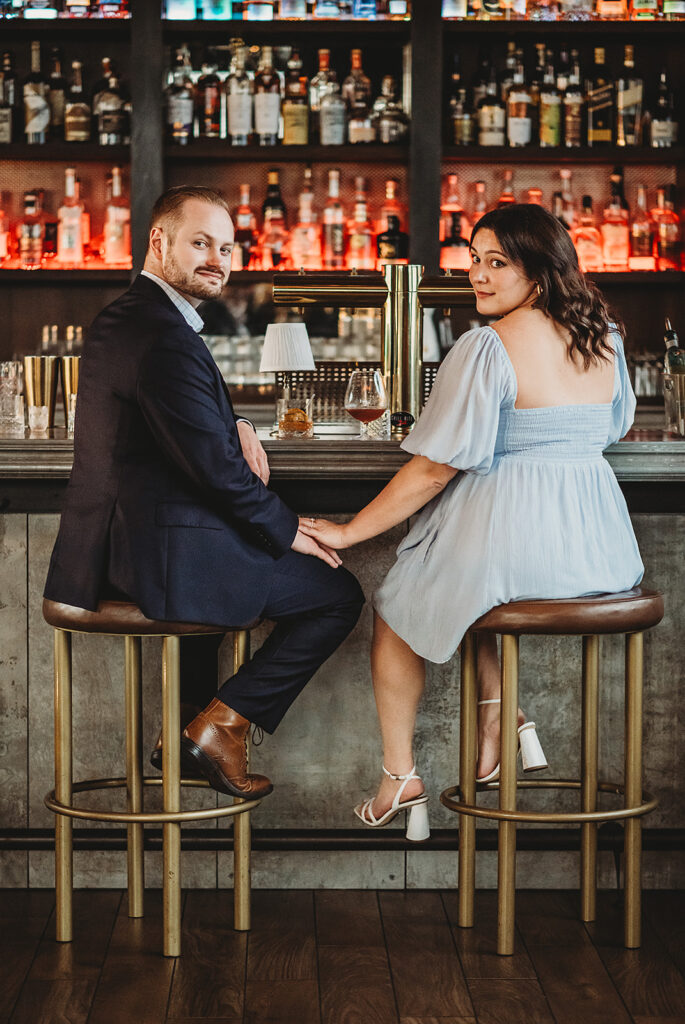Baltimore Wedding Photographer captures couple sitting at bar
